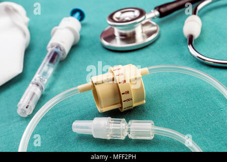 Dial flow next to stethoscope at a hospital table, conceptual image Stock Photo