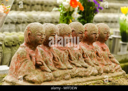 Japanese budhist monk statues praying and meditating Stock Photo