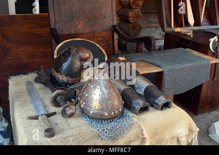 Metal, Viking helmet with chain mail in a black mannequin on white  background. clothes for the viking war Stock Photo - Alamy