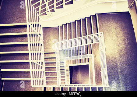 Looking down at a modern staircase, color toned picture. Stock Photo