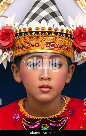 Bali, Indonesia - September 17, 2016: Portrait of an unidentified balinese young artist ready for Galungan celebration in Ubud, Bali. Stock Photo