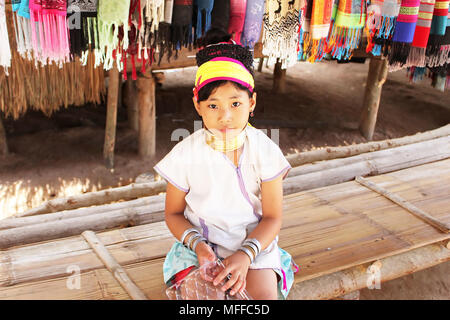 MAE HONG SON, THAILAND - JUNE 17, 2014: Unidentified Karen tribal girl near Mae Hong Son, Thailand, Chiang rai, Karen Long Neck hill tribe village Stock Photo