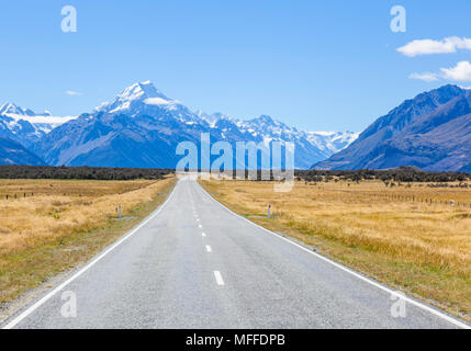 new zealand south island new zealand a straight empty road with no traffic in mount cook national park new zealand Stock Photo