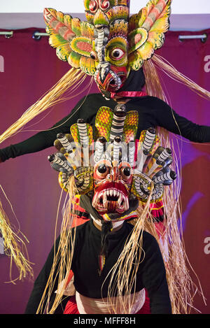 Vertical portrait of masked Kandyan Dancers in Kandy, Sri Lanka. Stock Photo