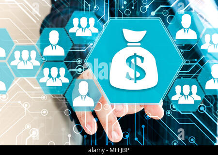 Business  Concept Crowdfunding Money. The businessman clicks on the button a sack of dollars on a virtual screen Stock Photo