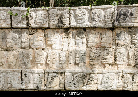 A long platform decorated with skulls shapes in Chichen Itza Stock Photo