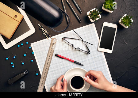 Architect working on blueprint. Architects workplace - architectural project, blueprints, tablet pc. Engineering tools. Top view Stock Photo