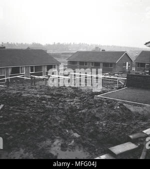 1960s, historical picture of newly built housing, bungalows. These detached single-storey houses became popular places to live in the 60s and 70s Britain, seen as 'modern living'. Stock Photo