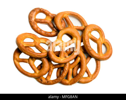 Salt pretzels on plate isolated white Top view Stock Photo