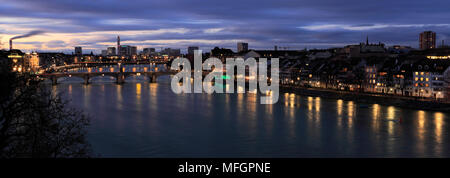 Dusk view over Klein Basel, Mittlere Brücke bridge, river Rhine, city of Basel, Canton Basel Stadt, Switzerland, Europe Stock Photo