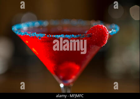 A Cosmopolitan cocktail at a restaurant. Stock Photo