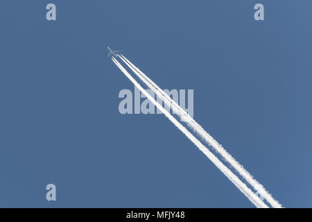 Vancouver, British Columbia, Canada. 26th May, 2017. A jet airliner leaves a contrail as it fllies overhead. Contrails are produced by aircrafts' engine exhaust. Credit: Bayne Stanley/ZUMA Wire/Alamy Live News Stock Photo