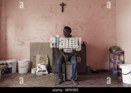 January 13, 2018 - Matatiele, Eastern Cape, South Africa - Kagiso, 35, sits in his mud house, which serves as a kitchen and a sleeping room for him and his two brothers. (Credit Image: © Stefan Kleinowitz via ZUMA Wire) Stock Photo