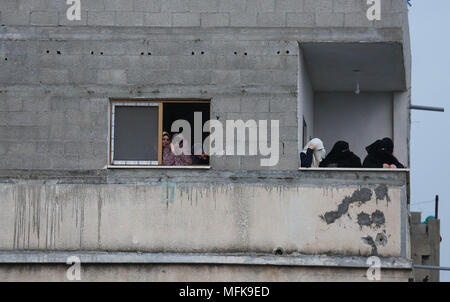 Gaza, Gaza Strip, Palestinian Territory. 26th Apr, 2018. Palestinian mourners carry the body of Palestinian scientist Fadi al-Batsh, assassinated in Malaysia, during his funeral in the northern Gaza Strip, on April 26, 2018. after his body was returned to his homeland, a member of the Islamist Hamas movement, was shot dead in a hail of bullets by motorbike-riding attackers as he walked to a Kuala Lumpur mosque for dawn prayers on April 21, 2018 Credit: Dawoud Abo Alkas/APA Images/ZUMA Wire/Alamy Live News Stock Photo