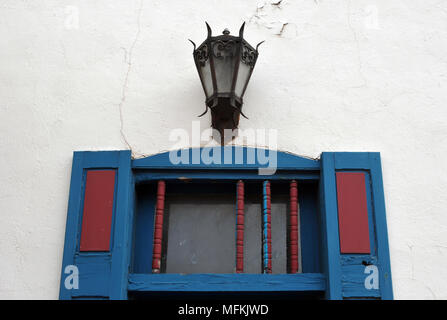 An ornate light and colorful wooden door frame on a historic building in Old Town Albuquerque, New Mexico. Stock Photo