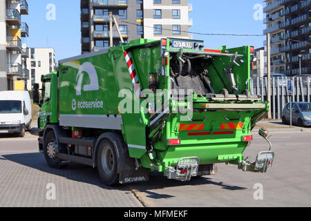 VILNIUS, LITHUANIA - APRIL 08, 2018: Truck for garbage disposal company EcoService arrives at the Maxima store in the Pilaite  district area. The comp Stock Photo