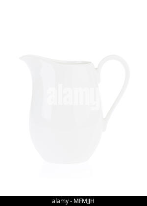 White porcelain cream pitcher isolated on white background Stock Photo