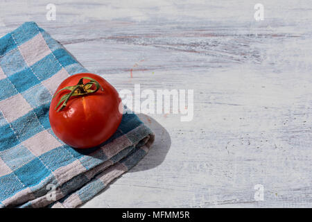 Fresh organic red tomato at retro white background/ food background/ closeup still life food photography Stock Photo
