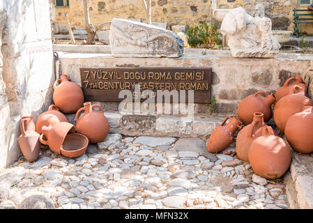 Different shape and size of amphoras in Castle of St. Peter or Bodrum Castle, Turkey. Stock Photo