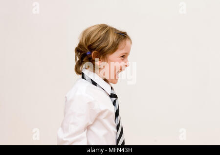 Side profile of a girl laughing   Ref:   Compulsory Credit: Stock Photo