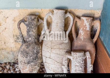 Different shape and size of amphoras in Castle of St. Peter or Bodrum Castle, Turkey.Collection of amphoras from different parts of the Mediterranean Stock Photo