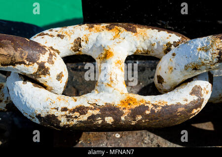 Rusty chain links of an anchor chain on a ship Stock Photo