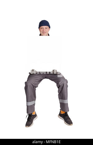 Worker, Ventilation and air conditioning installer sits, insulated Stock Photo