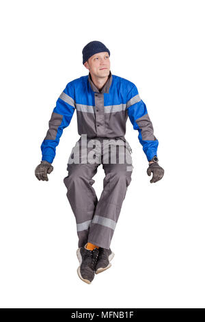Worker, Ventilation and air conditioning installer sits, insulated Stock Photo