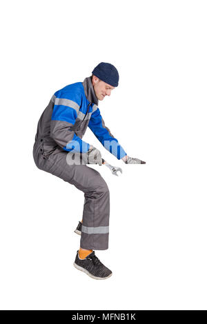 Worker, Ventilation and air conditioning installer sits, insulated Stock Photo