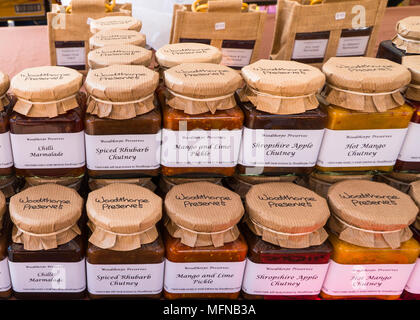 Selection of homemade Pickles and Chutney by Woodthorpe Preserves. Ludlow street market Shropshire UK. April 2018 Stock Photo