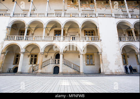 Section of the Italian style, Renaissance, inner courtyard of Wawel Castle, Krakow, Poland. Open galleries, balustrades and arcaded walkways Stock Photo