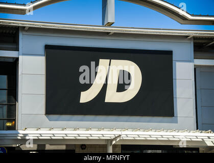 Large sign above the entrance to a JD Sports store on a retail park Stock Photo