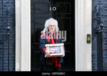 Queen guitarist Brian May alone with animal-protection campaigners including two wearing giant papier mâché fox and rabbit heads on the steps of 10 Downing Street with a petition of more than 400,000 signatures urging Prime Minister Theresa May to introduce a UK animal-fur import ban.  Featuring: Brian May Where: London, United Kingdom When: 26 Mar 2018 Credit: Dinendra Haria/WENN Stock Photo