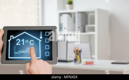 tablet pc with smart home settings on screen Stock Photo
