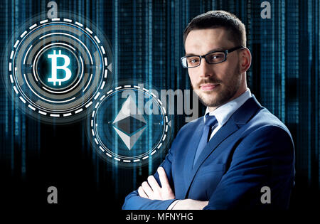 businessman with cryptocurrency holograms Stock Photo