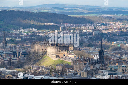 Looking towards Edinburgh Castle in sunlight from Arthur's Seat in Edinburgh, Scotland, UK