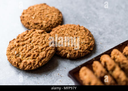 Oatmeal Cookies made with sesame, fig, cinnamon, peanut and sunflower seeds. Organic Food. Stock Photo