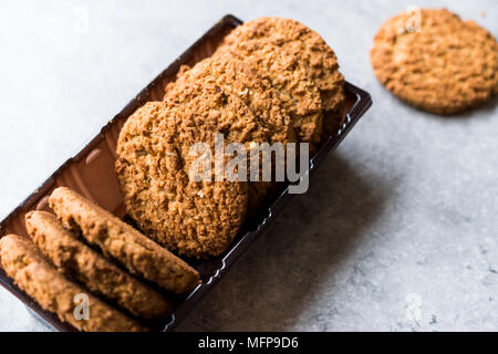 Oatmeal Cookies made with sesame, fig, cinnamon, peanut and sunflower seeds. Organic Food. Stock Photo