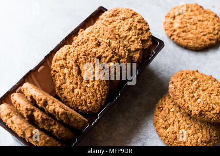 Oatmeal Cookies made with sesame, fig, cinnamon, peanut and sunflower seeds. Organic Food. Stock Photo