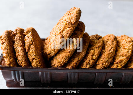 Oatmeal Cookies made with sesame, fig, cinnamon, peanut and sunflower seeds. Organic Food. Stock Photo