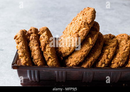 Oatmeal Cookies made with sesame, fig, cinnamon, peanut and sunflower seeds. Organic Food. Stock Photo