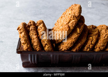 Oatmeal Cookies made with sesame, fig, cinnamon, peanut and sunflower seeds. Organic Food. Stock Photo