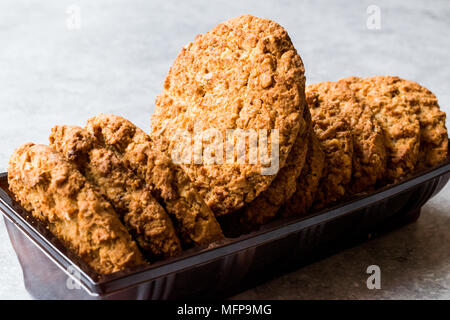 Oatmeal Cookies made with sesame, fig, cinnamon, peanut and sunflower seeds. Organic Food. Stock Photo