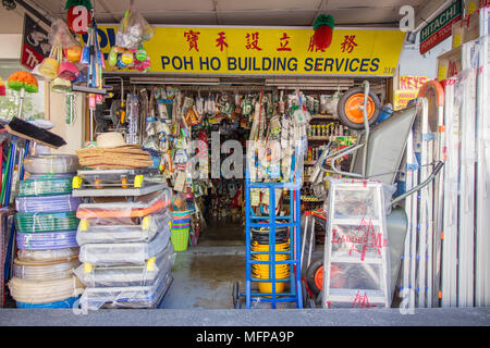 Front view of a Hardware store in Asia. Traditional showcase of tool store. Toolboxes and toolkit in the shop. Stock Photo