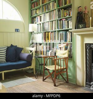 Fireplace And Built In Shelves In Living Room Stock Photo