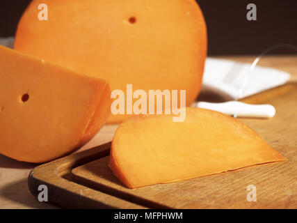 French Cheese called Mimolette, Cheese made from Cow's Milk Stock Photo