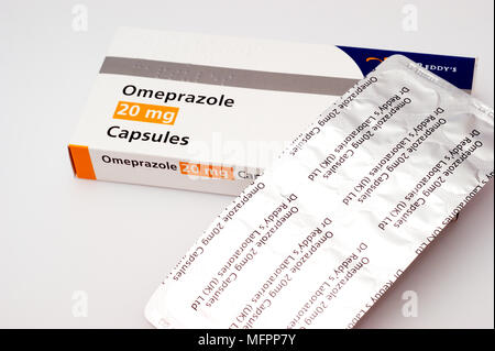 Capsules containing Omeprazole as gastro - resistant granules Stock Photo