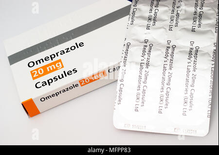 Capsules containing Omeprazole as gastro - resistant granules Stock Photo