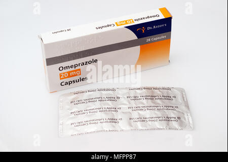 Capsules containing Omeprazole as gastro - resistant granules Stock Photo