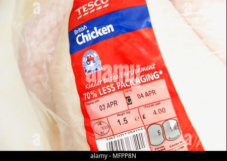 Fresh chicken with 70% less packaging & the assured food standards association British logo the little red tractor symbol Stock Photo